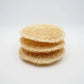 Tres discos exfoliantes faciales de luffa 100% natural, vegetal y biodegradable de la marca Iberluffa en Piperita Bio.