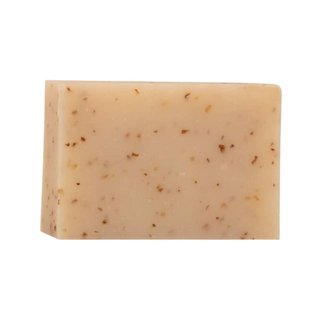 Pastilla de jabón natural de avena Essabó sin envoltorio mostrando sus partículas exfoliantes.