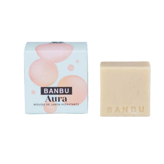 Limpiador facial sólido hidratante Aura de la marca Banbu, con su caja de embalaje. 